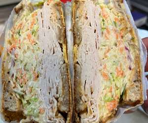 Our inside out “Joe” house roasted turkey, bread, slaw Russian made in house. Swiss griddled to the outside for a crisp bite 